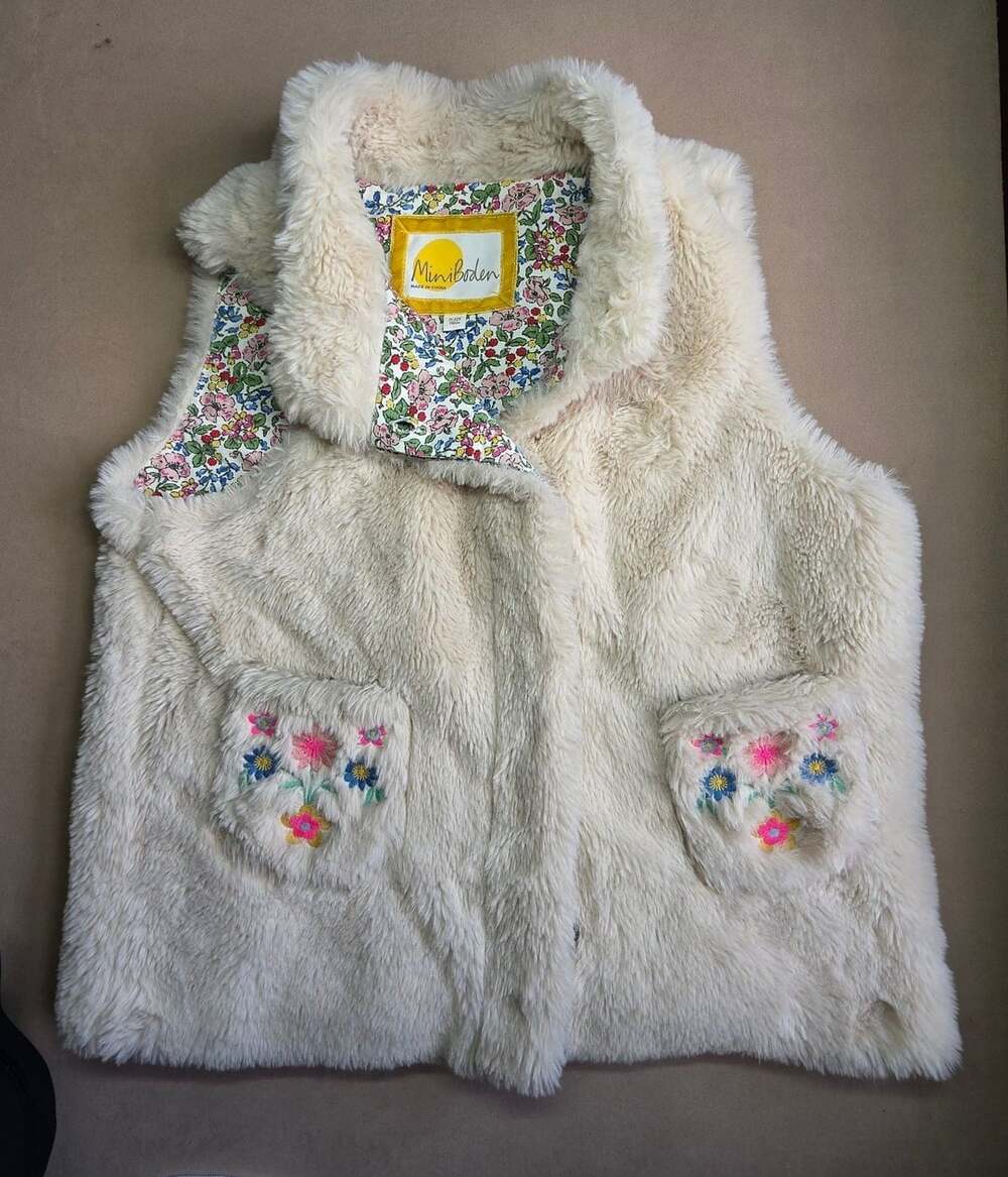 Mini Boden Girls Cream Faux Fur Vest With Floral Lining and Embroidered Pockets